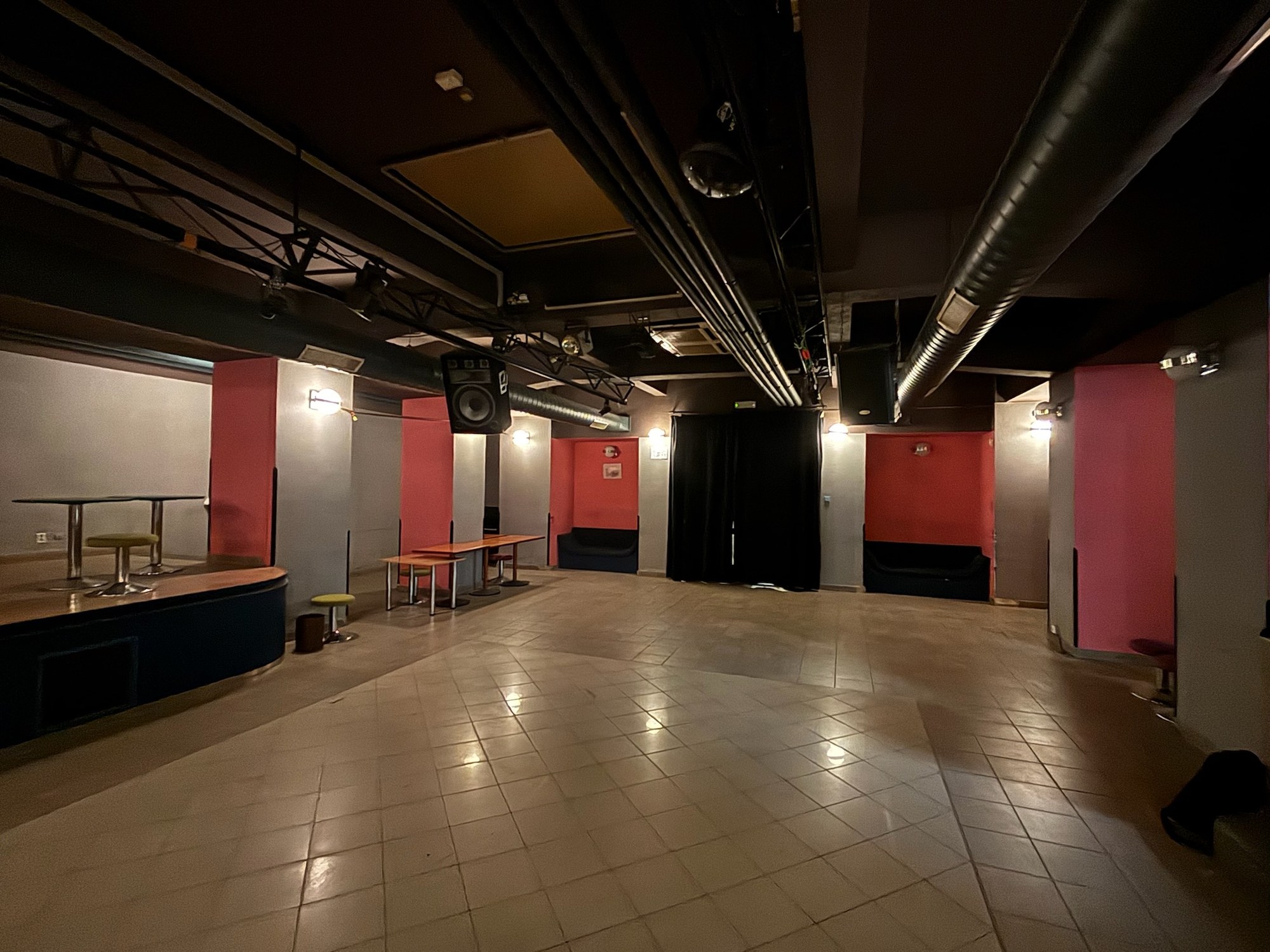 The empty dark basement before the renovation