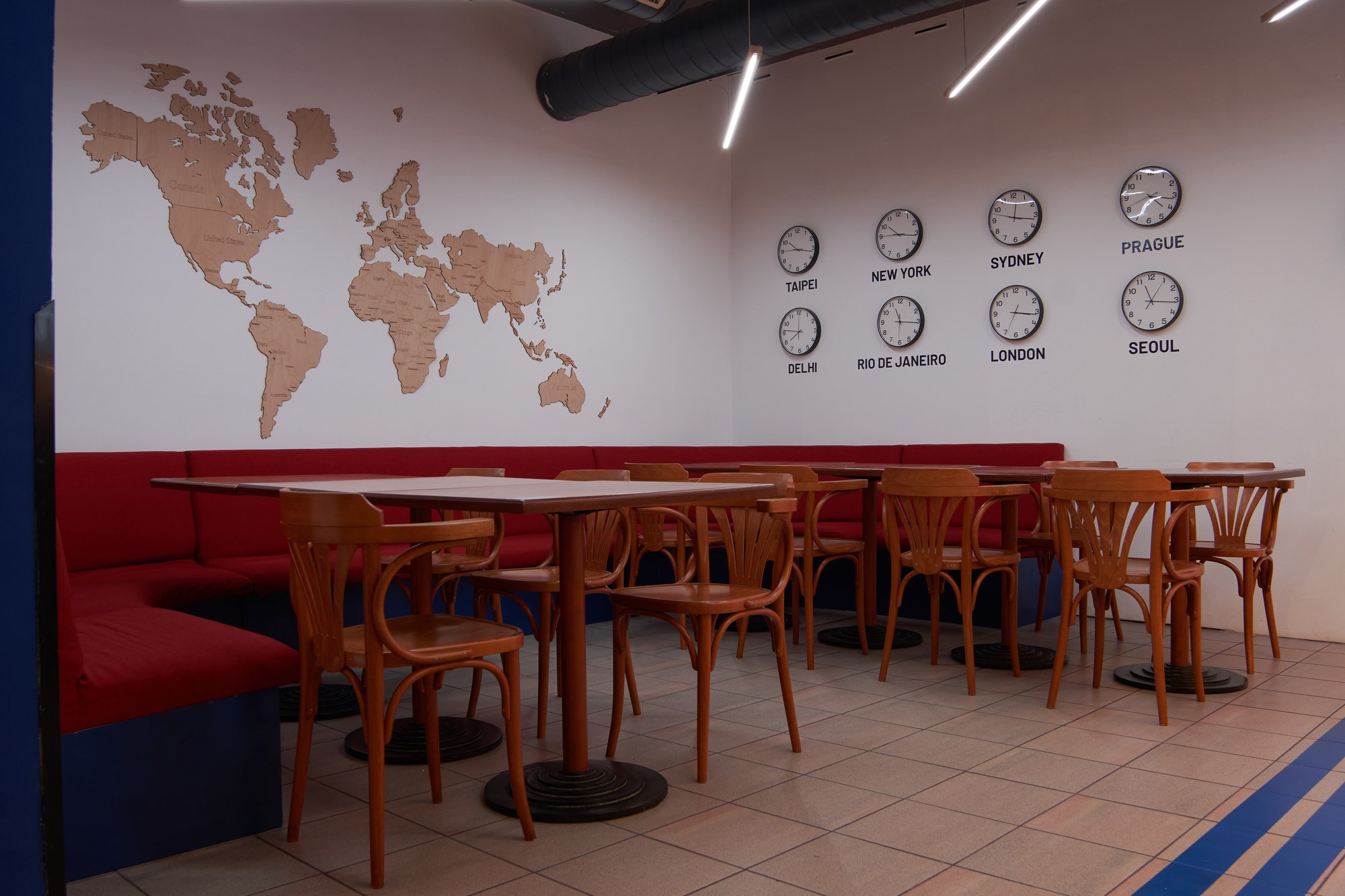 The bar area after, cork world map and clocks showing world times
