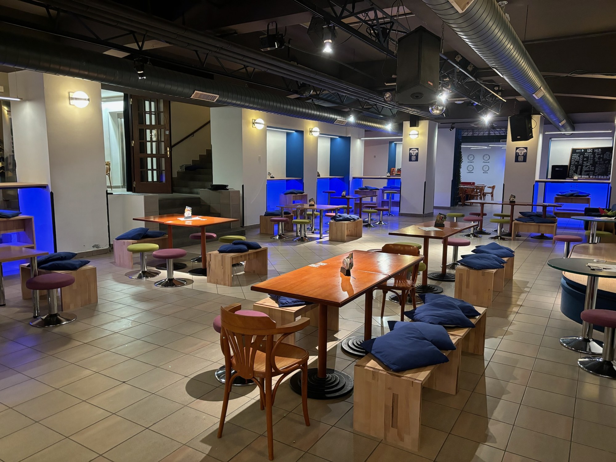 The main hall after the renovation, blue wash, benches and tables