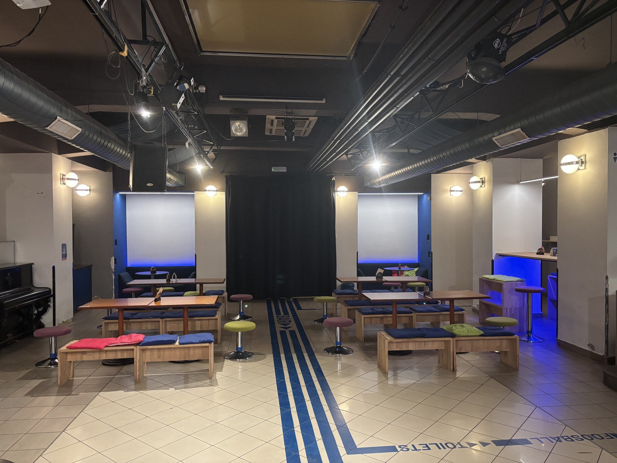 The hall with both screens lit